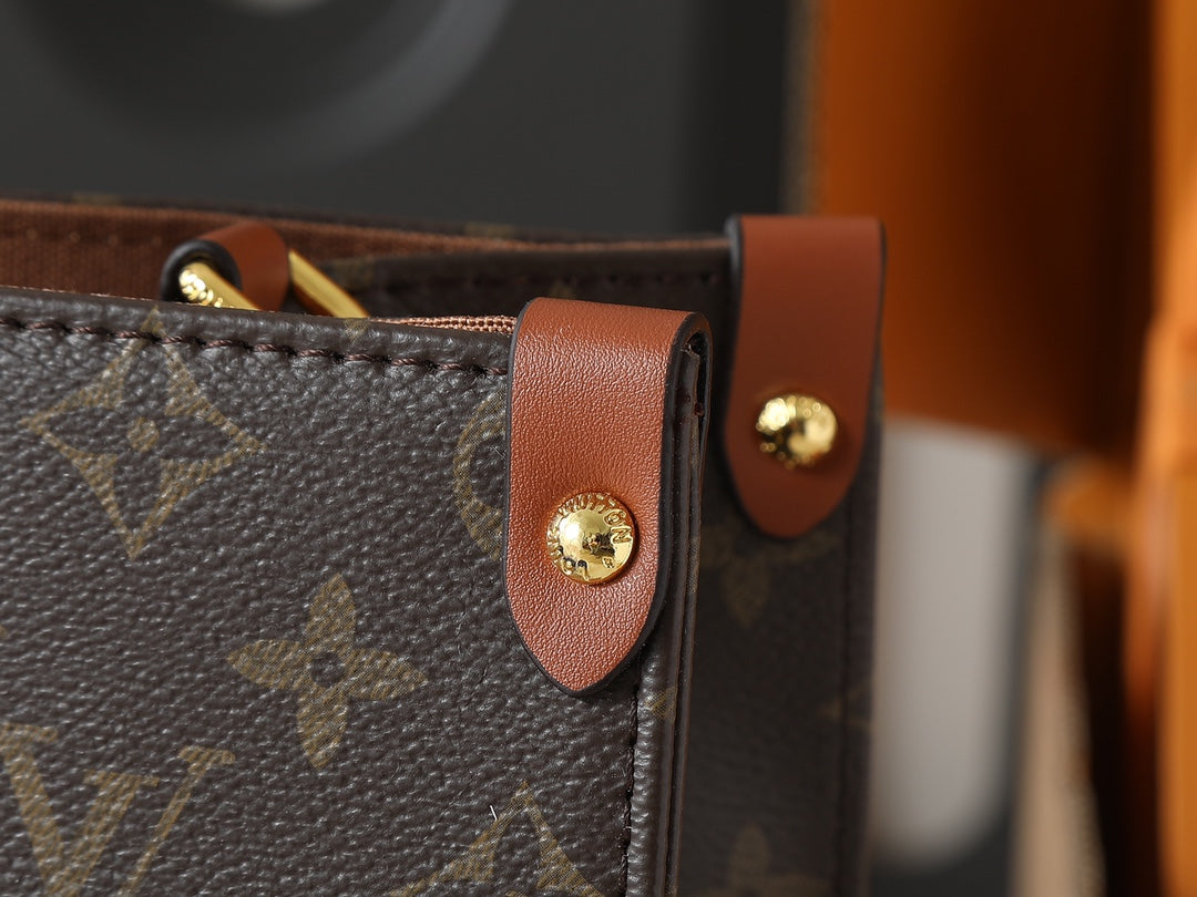 Louis Vuitton OnTheGo Organizer Handbag